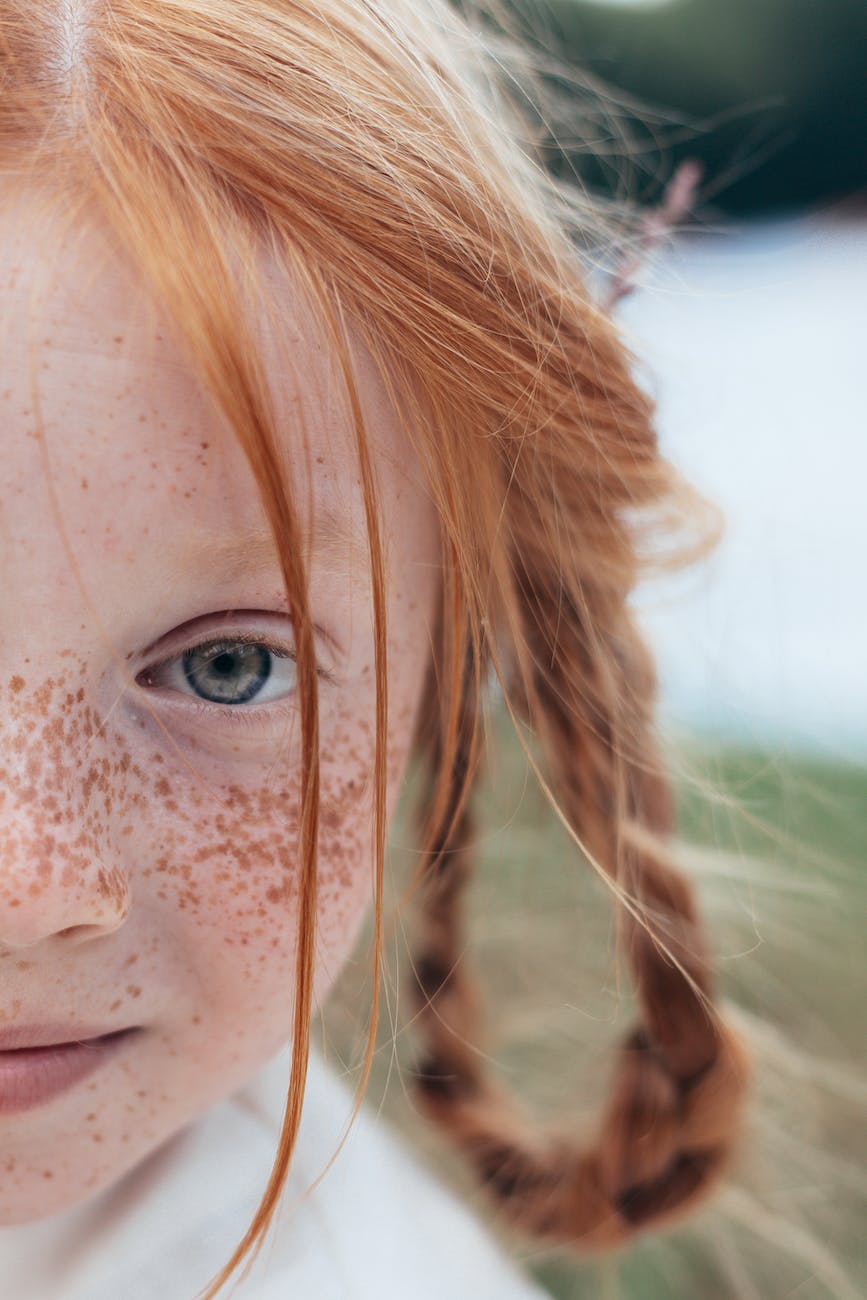 close up of face of red haired girl