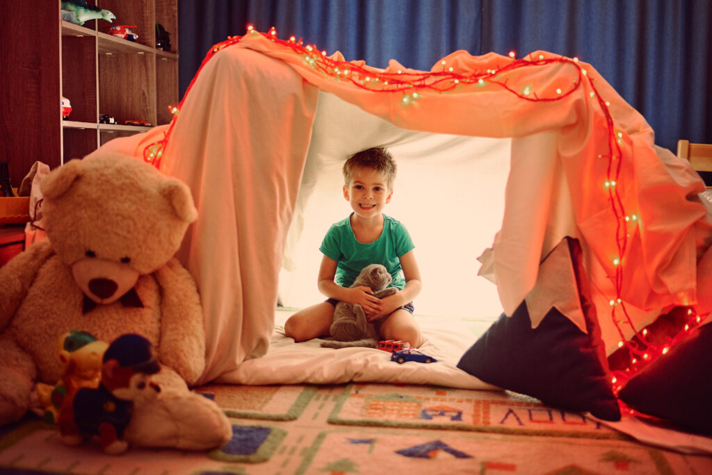 Kids have fun building forts with tents.