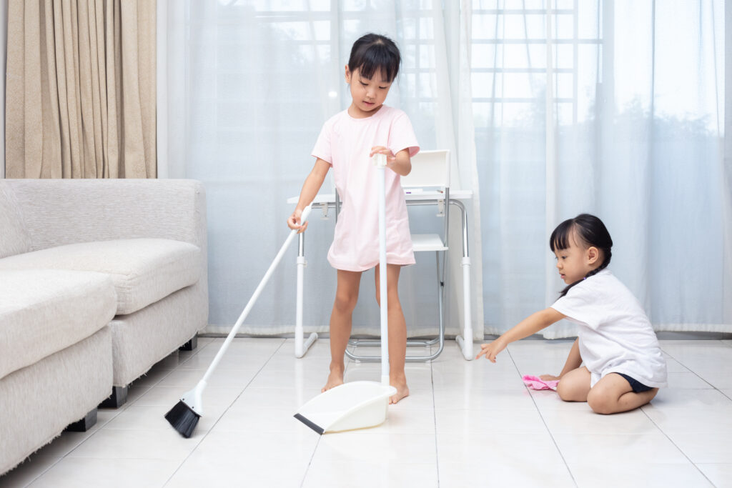 Asian Children doing house chores