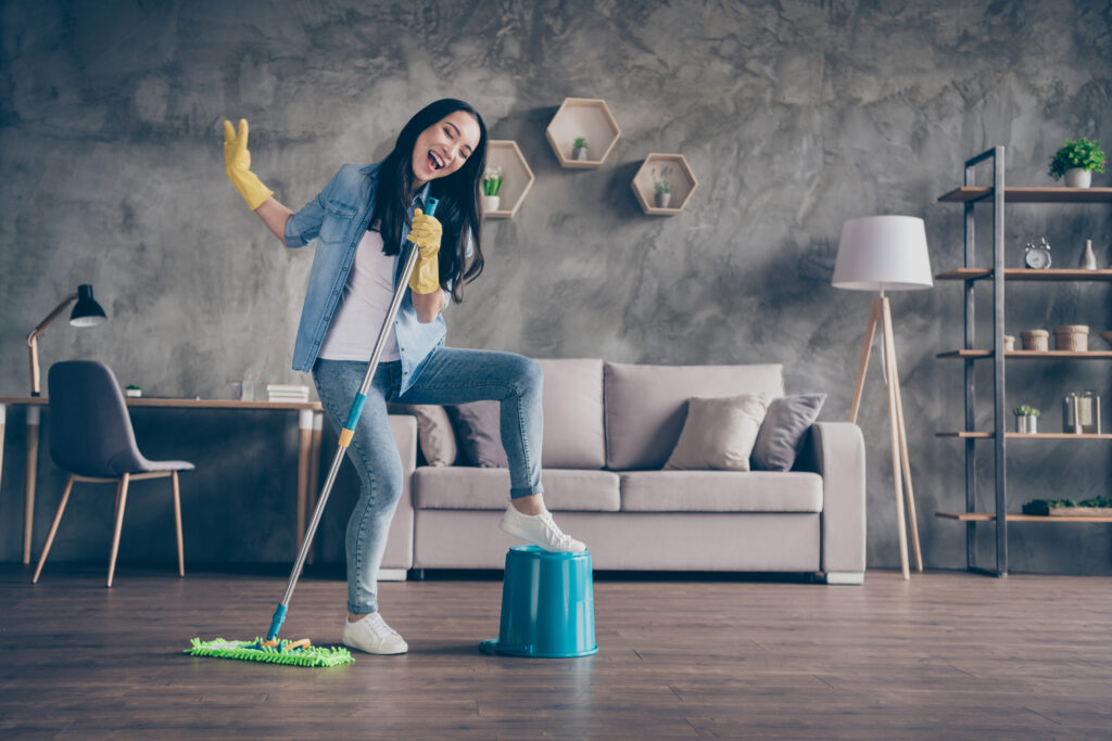 woman having fun doing her chores