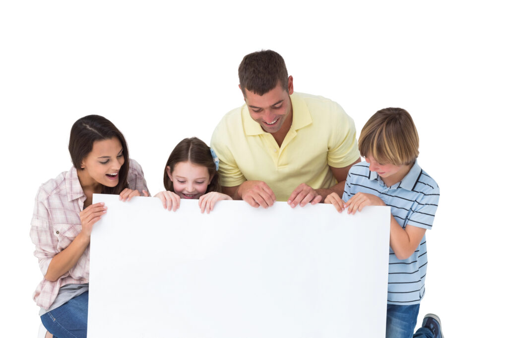 Family works together on a vision board.